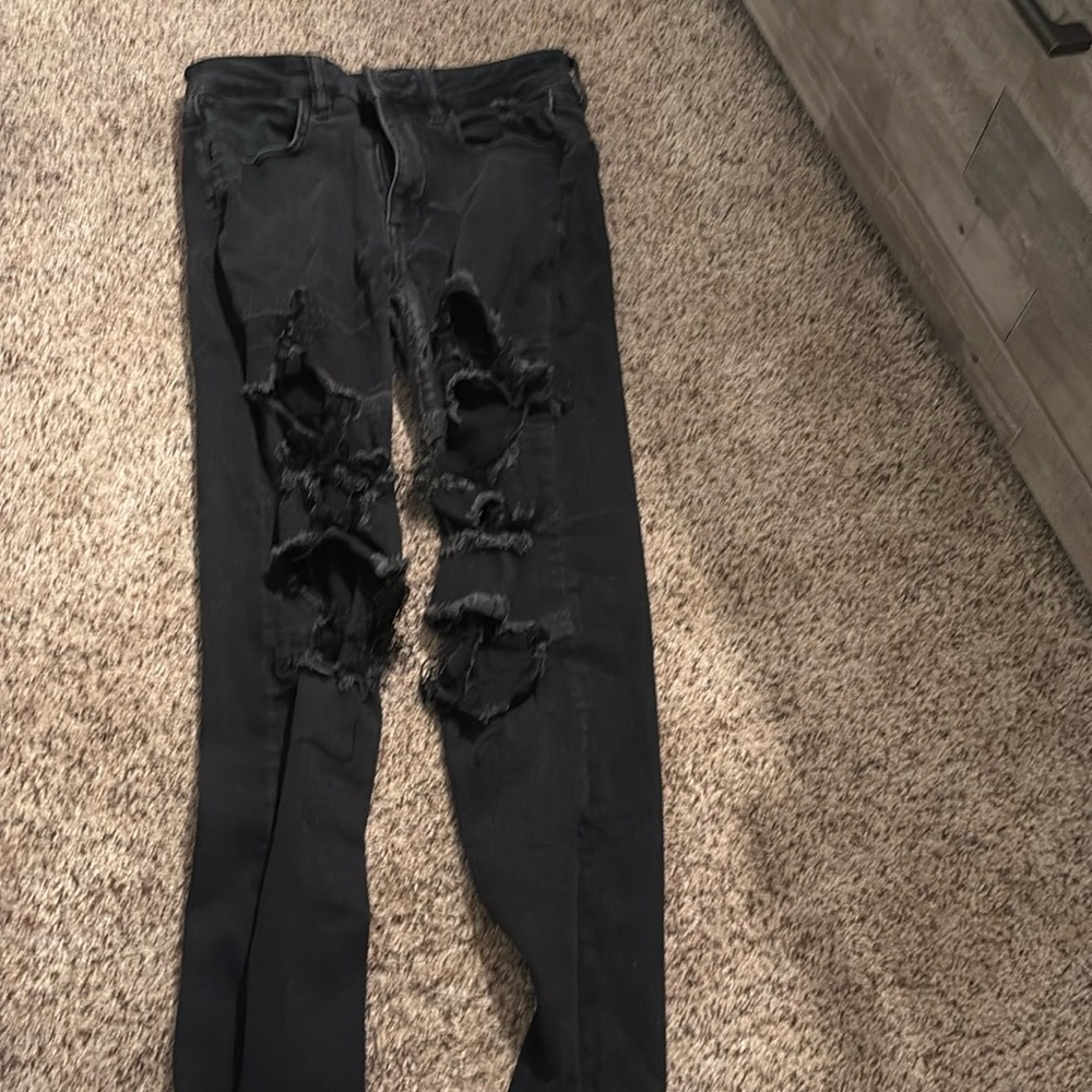 Black skinny ripped jeans